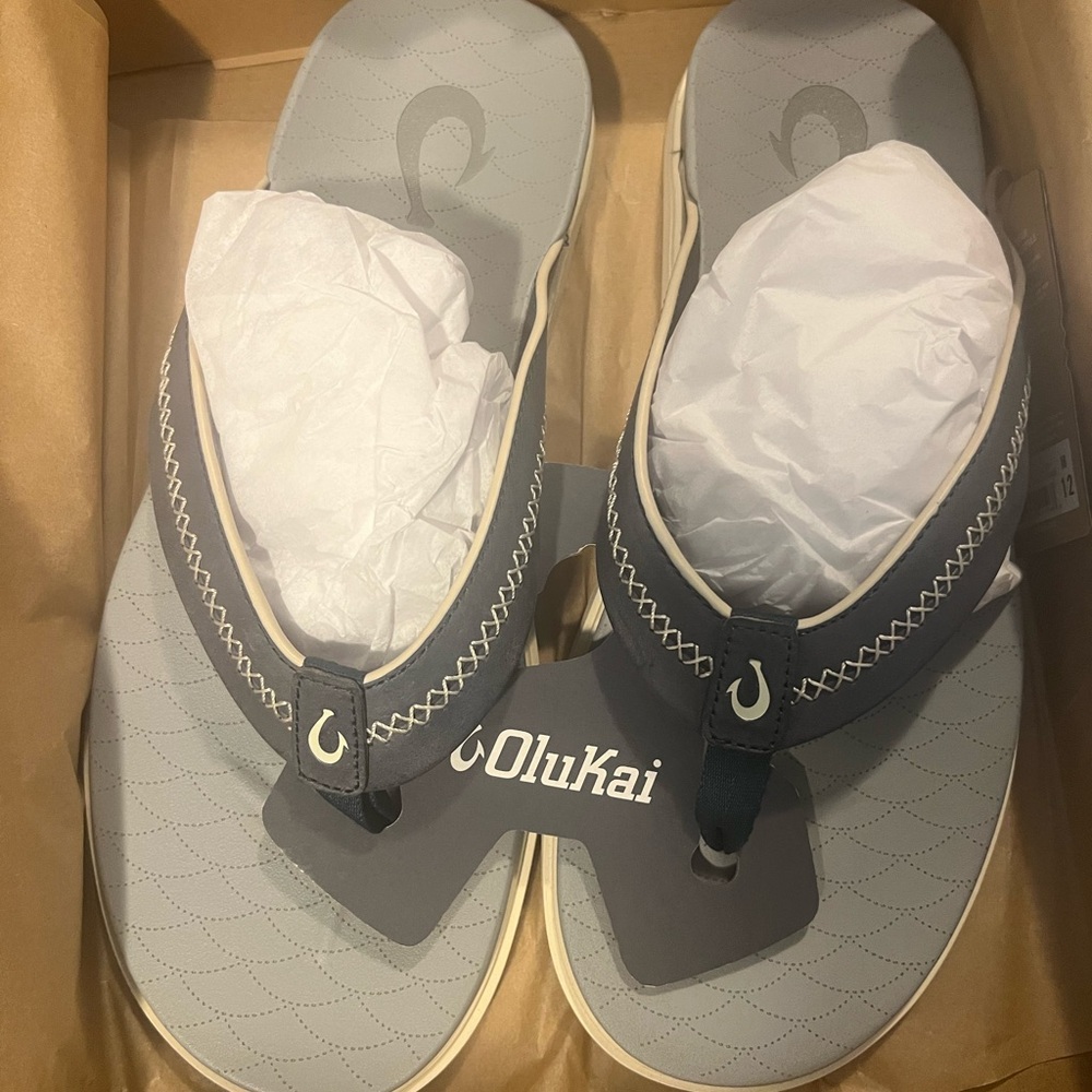 OluKai Cream Flip Flops with Black Logo